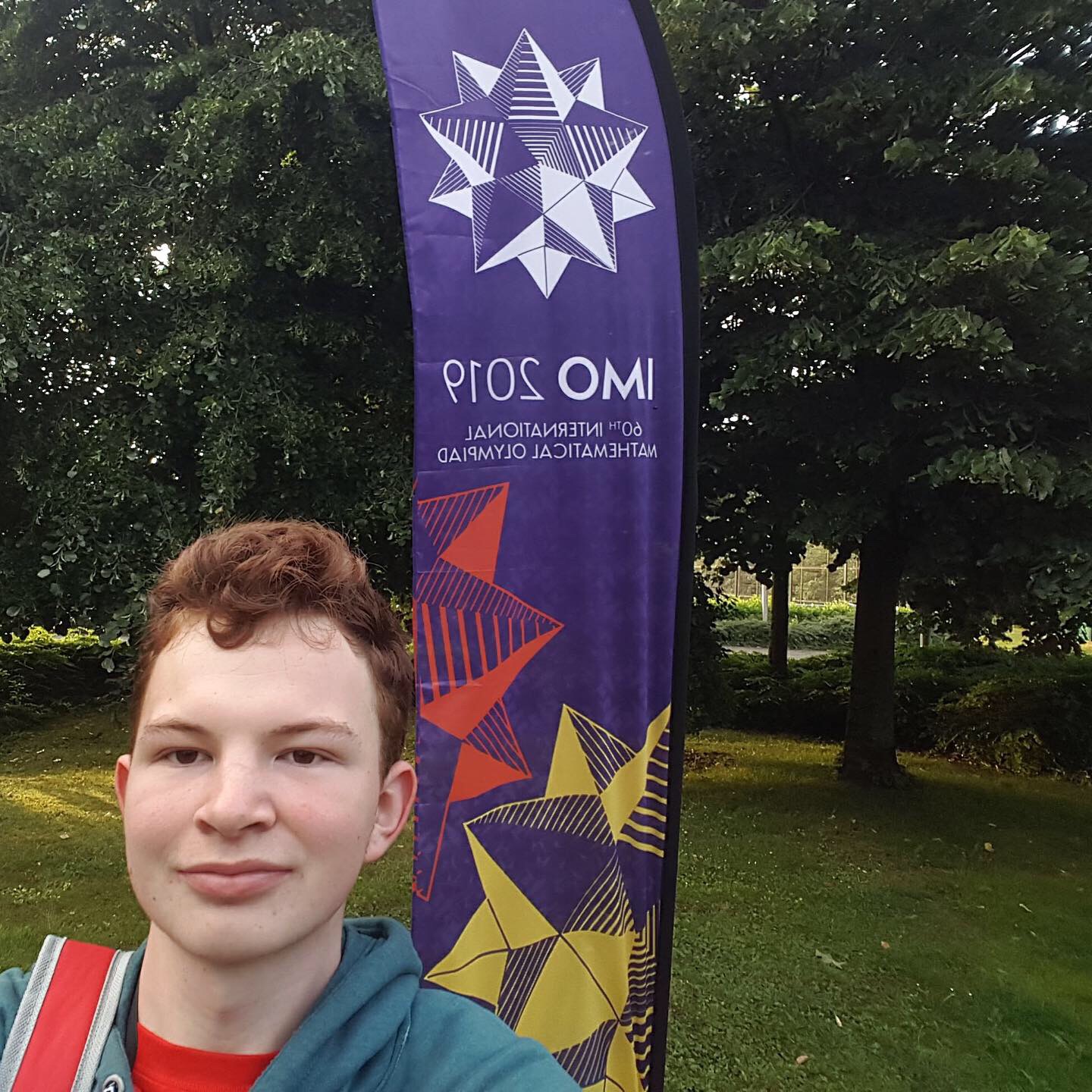 Myself infront of an IMO Flag